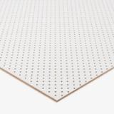 A white coated sheet of MDF pegboard 